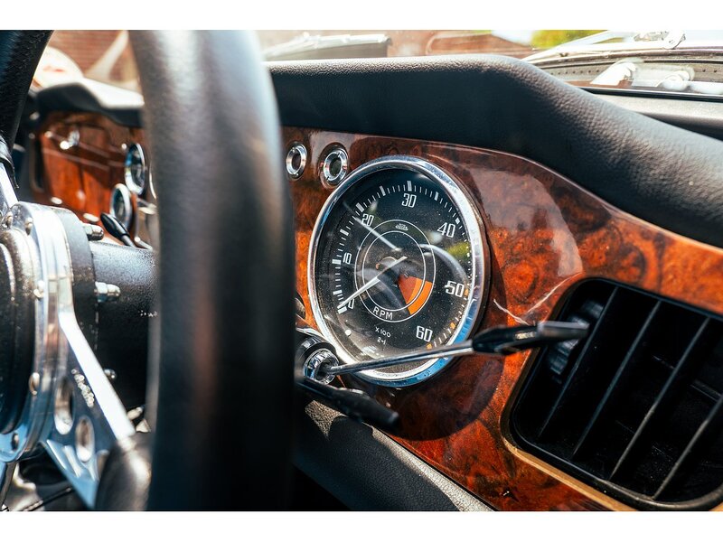 Triumph 1965 Triumph TR4A with Surrey top Petrol