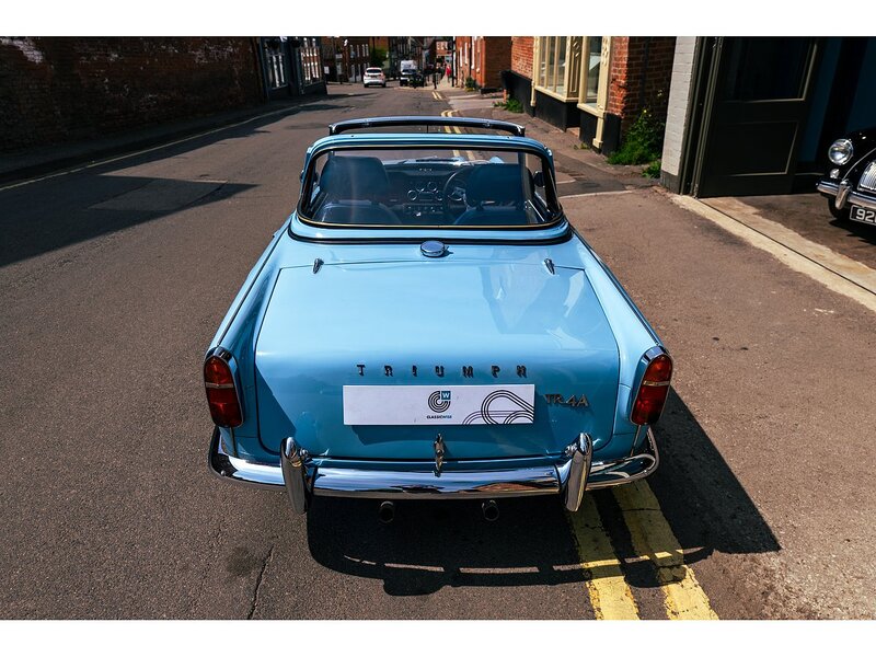 Triumph 1965 Triumph TR4A with Surrey top Petrol