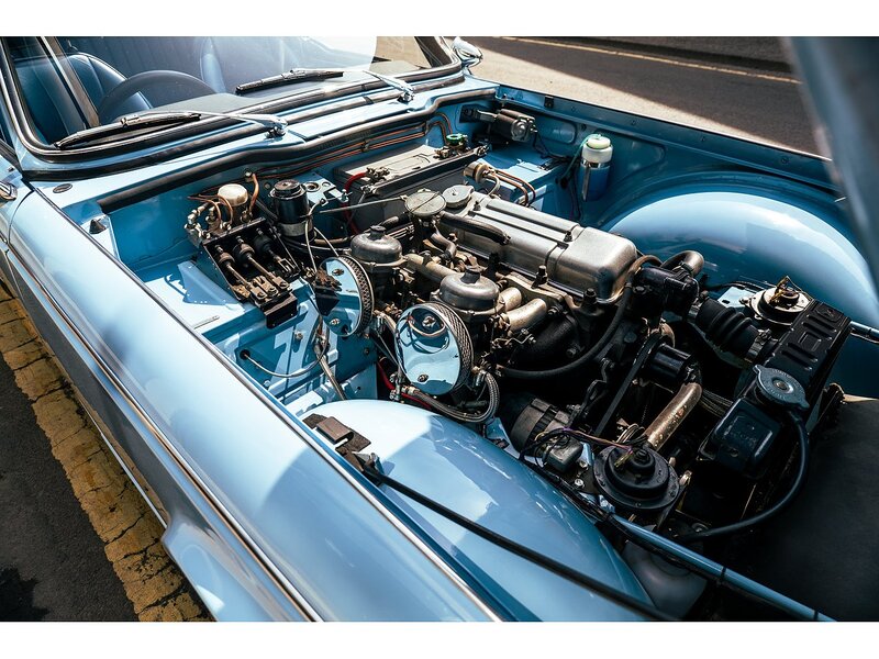Triumph 1965 Triumph TR4A with Surrey top Petrol