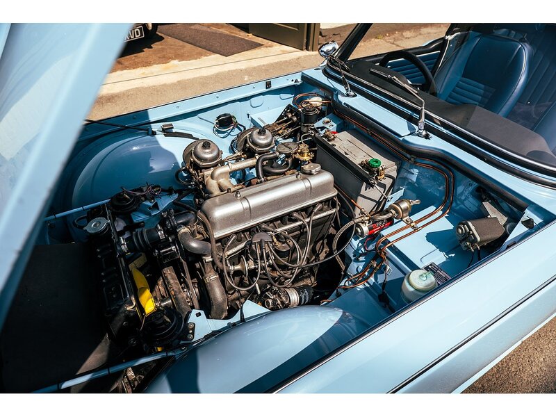 Triumph 1965 Triumph TR4A with Surrey top Petrol