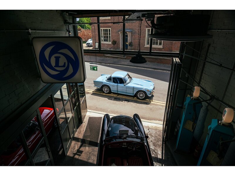 Triumph 1965 Triumph TR4A with Surrey top Petrol