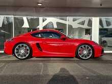 PORSCHE CAYMAN GTS IN CARMINE RED