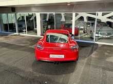 PORSCHE CAYMAN GTS IN CARMINE RED