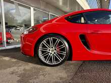PORSCHE CAYMAN GTS IN CARMINE RED
