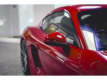PORSCHE CAYMAN GTS IN CARMINE RED