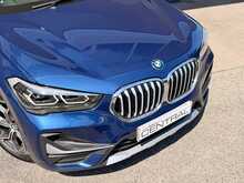 BMW X1 FINISHED IN PHYTONIC BLUE